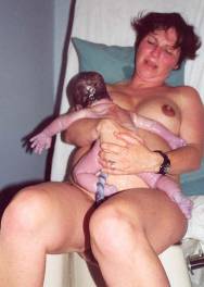 Photo of Tracey with baby on Birthing Seat