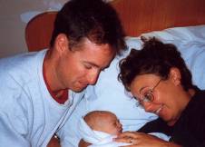 Photo of family after birth on Birthing Seat